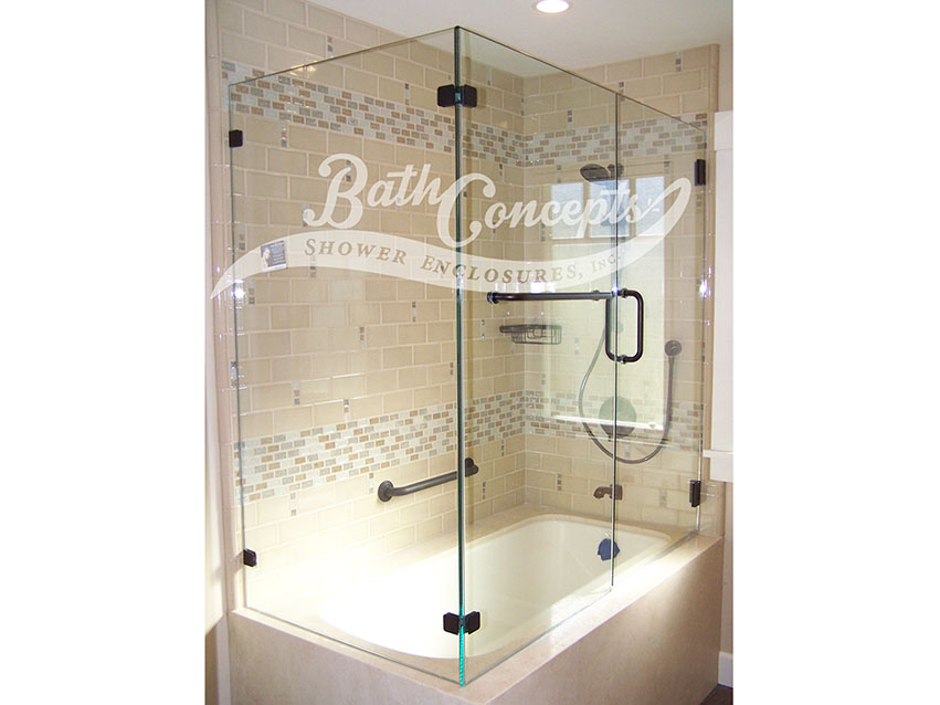 7 Frameless corner enclosure with an inline & return stationary panel with a towel bar on the inline panel CLEAR GLASS BRUSHED NICKEL HARDWARE 1143 - 1243