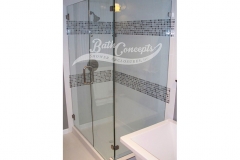 10 Frameless corner enclosure with an inline & return stationary panel CLEAR GLASS BRUSHED NICKEL HARDWARE 1193 - 1293