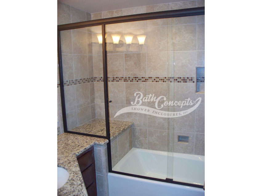 11 Frameless traditional sliding enclosure and an inline panel with 2 knobs CLEAR GLASS OIL RUBBED BROZE HARDWARE 374 -1074