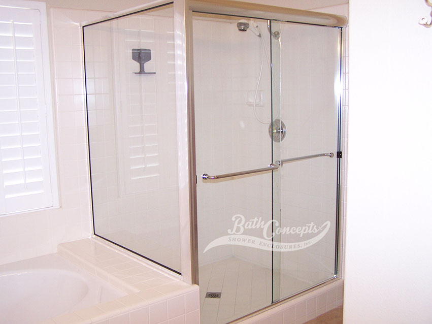 12 Frameless traditional sliding enclosure and a return panel with 2 towel bars CLEAR GLASS BRUSHED NICKEL HARDWARE 372 - 1072